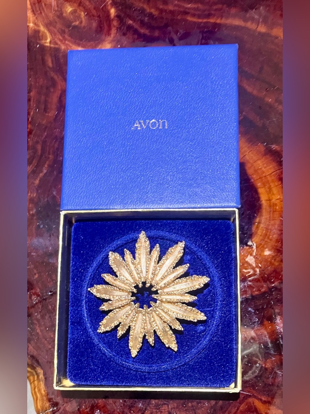 NIB! The Avon Gold Tone Sunburst Brooch in Blue Velvet Box